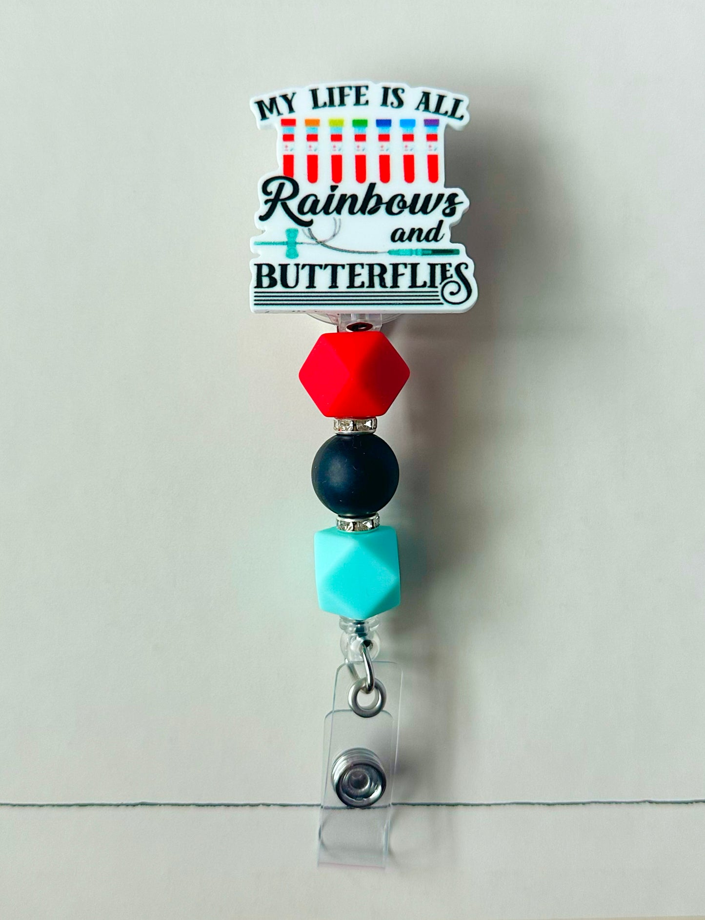 Rainbows and Butterflies Badge Reel